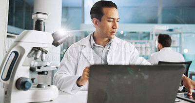 Buy stock photo Microscope, science and laptop with man in laboratory for dna sample, forensics investigation and healthcare. Research report, genetic analysis and medical test with person for pathology and clinic