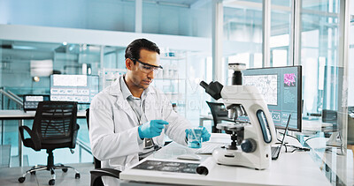 Buy stock photo Microscope, beaker and research with man in laboratory for chemical sample, cancer cure and healthcare. Cell treatment, report and medical test with person in clinic for tumor enzyme and record