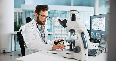 Buy stock photo Microscope, science and clipboard with man in laboratory for tissue sample, cancer research and healthcare. Cell treatment, report and medical test with person in clinic for tumor enzyme and record