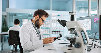 Buy stock photo Clipboard, research and science with man in laboratory for clinical trial results, vaccine record and microscope. Healthcare report, medical and virus cure with person in clinic for bacteria sample