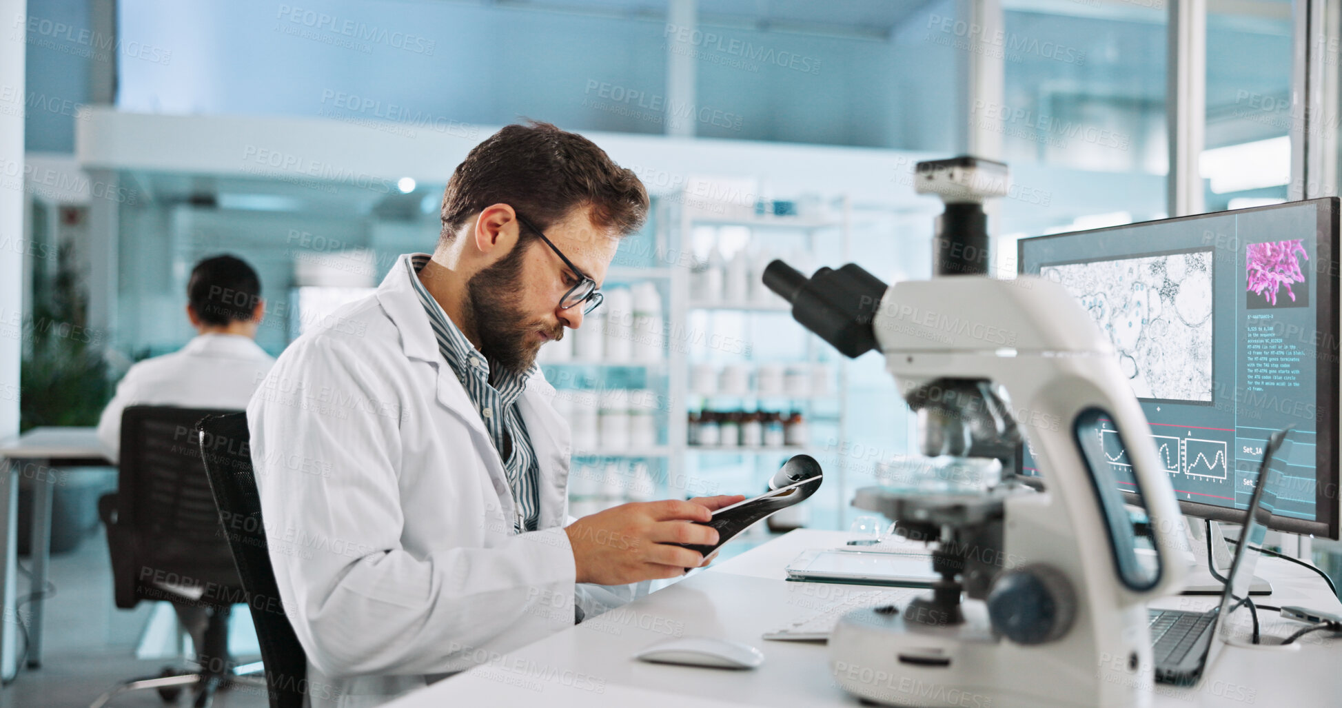 Buy stock photo Clipboard, research and science with man in laboratory for clinical trial results, vaccine record and microscope. Healthcare report, medical and virus cure with person in clinic for bacteria sample
