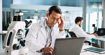 Buy stock photo Headache, laptop and stress with man in laboratory for research mistake, clinical trial fail or science. Healthcare error, tired and medical test results with person in clinic for online and glitch