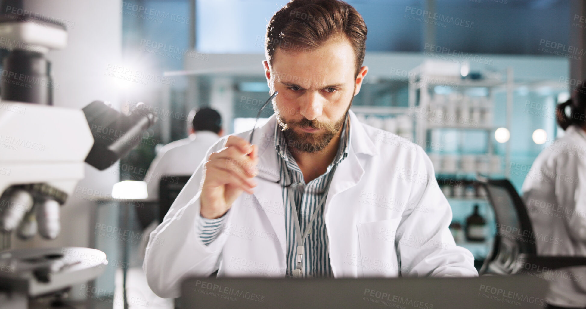 Buy stock photo Science, laptop and glasses with man in laboratory for clinical trail, reading and research. Medical journal report, review and pharmacy drug development with person for healthcare and biotechnology