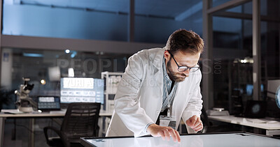 Buy stock photo Scientist, man and test with screen for lab review, medical research or innovation. Computer table, interactive display and clinical analysis for studying science data, laboratory and results