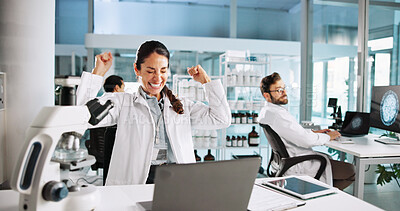 Buy stock photo Woman, scientist and celebration with fist pump in lab with medical research, cheers or success. Person, equipment and clinical study for vaccine with goals, dna and laptop for pharmaceutical trial