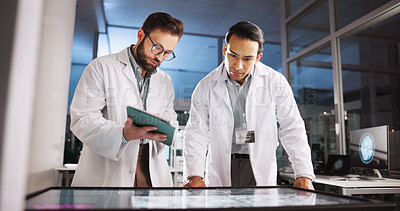 Buy stock photo Scientist, men and tablet with screen in meeting for laboratory, medical research or innovation. Computer table, interactive display and clinical analysis for science, data study or teamwork review