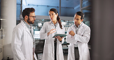 Buy stock photo Scientist, talk and meeting on tablet in lab for research, medical investigation and pharmaceutical report. People, explain and digital for planning, biology study and information of vaccine solution