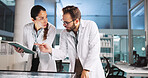 Scientist, people and teamwork with tablet for review, medical research or innovation. Computer table, interactive display and clinical biotech partnership for science, study meeting or results