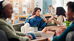Office, business women and discussion on sofa, planning project and meeting on coffee break. Team, conversation and coworking in company lounge for relax, brainstorming ideas and listening to story