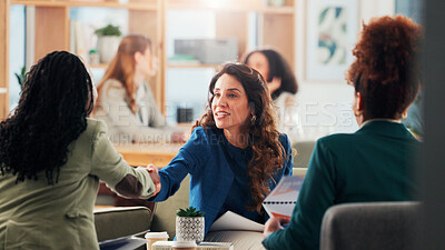 Buy stock photo Business women, meeting or handshake with documents for company discussion, review or partnership at office. Female people, colleagues or shaking hands for agreement, deal or contract at workplace