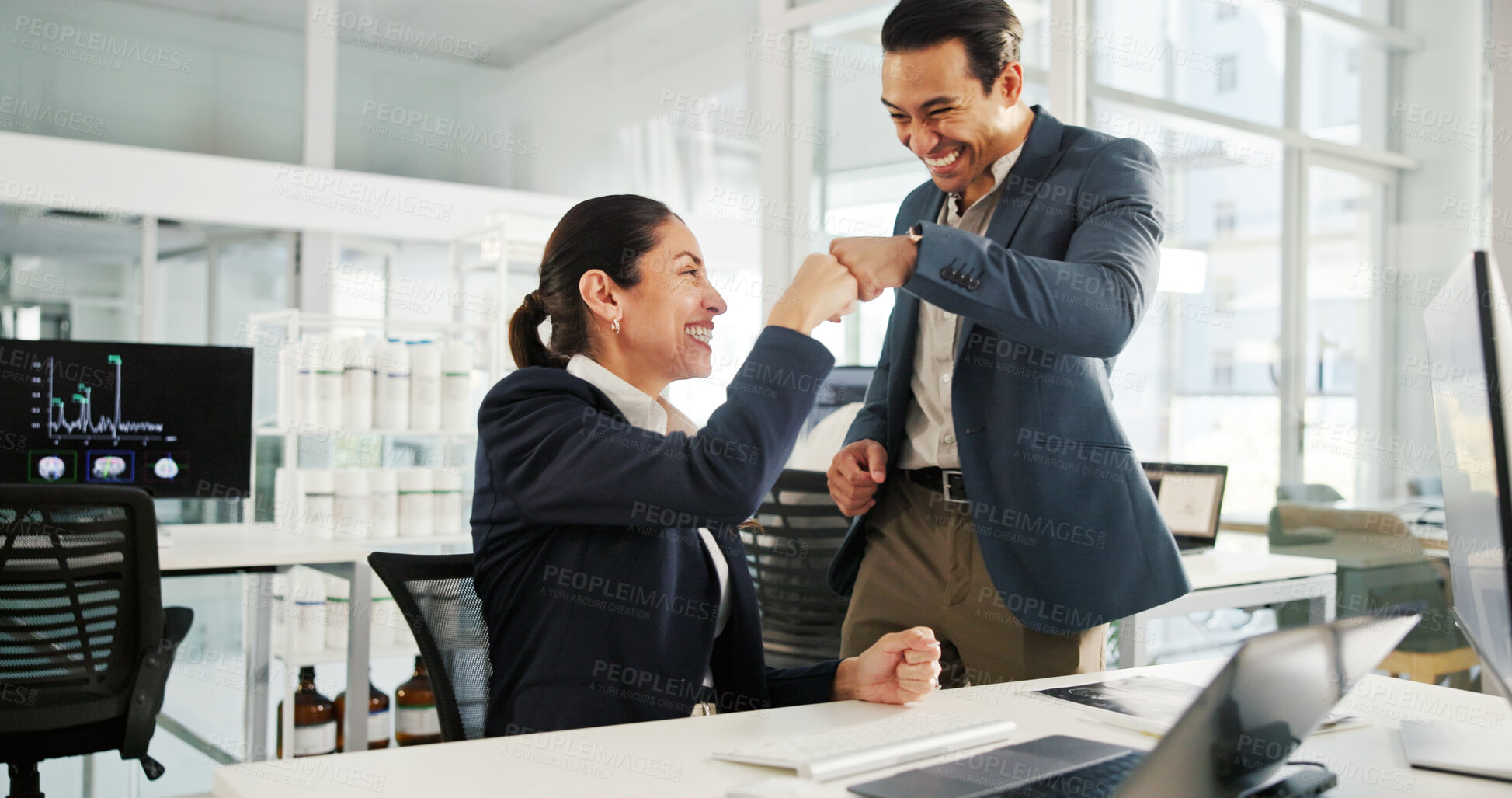 Buy stock photo Business people, success and celebration with fist bump at office for neurology study, results or good news. Businessman, woman or employees with smile for medical investment, profit or teamwork