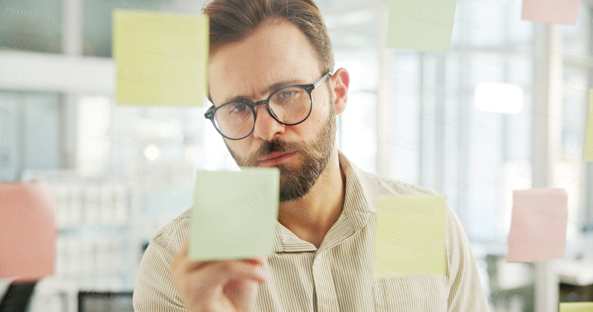 Buy stock photo Business man, glass wall and writing on sticky notes for campaign development, creative ideas and planning. Marketing manager, employee and brainstorming for advertising strategy or branding mind map