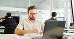 Man, laptop and typing in hospital for research, project management and scientific study. Medical engineer, tech or review in coworking space for healthcare innovation with pharmaceutical development