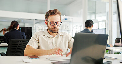 Buy stock photo Man, laptop and typing in hospital for research, project management and scientific study. Medical engineer, tech or review in coworking space for healthcare innovation with pharmaceutical development