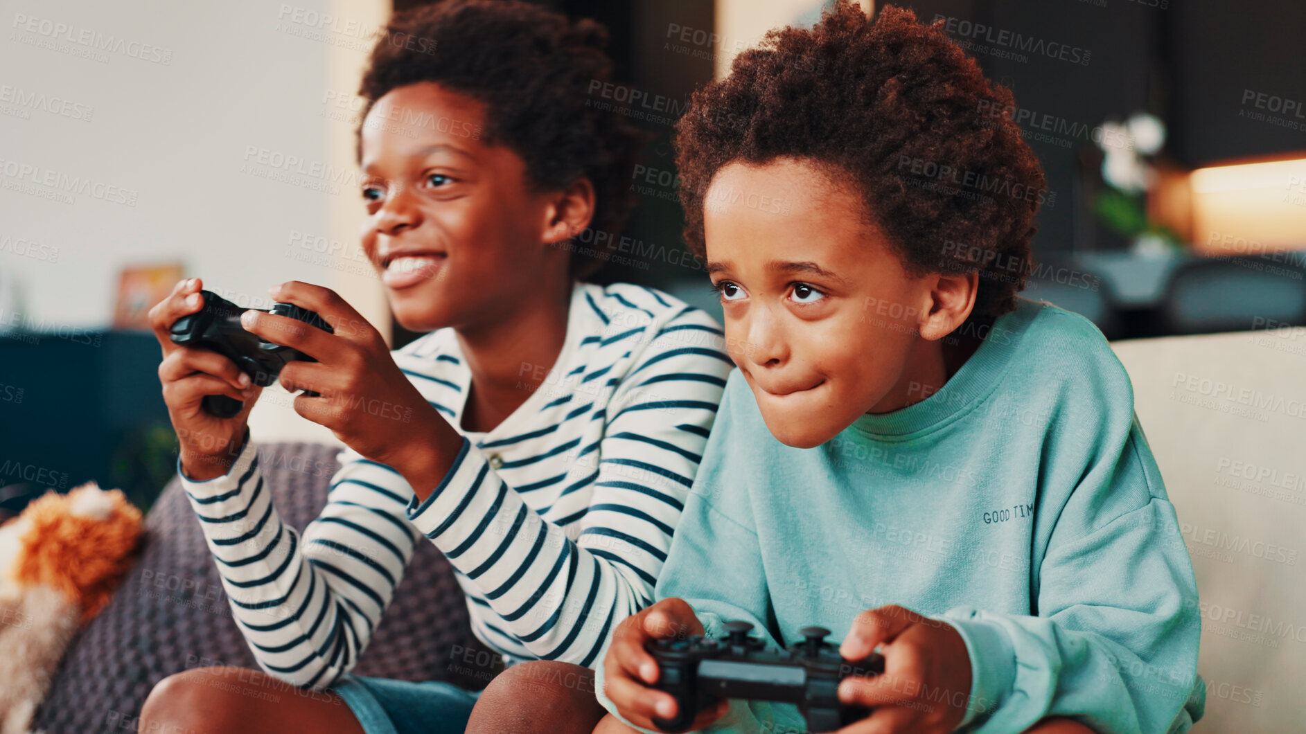 Buy stock photo Video games, TV and children on sofa in home for competition, winning and playing online in living room. Gaming, family and happy kids on couch with controller for fun, entertainment and relaxing