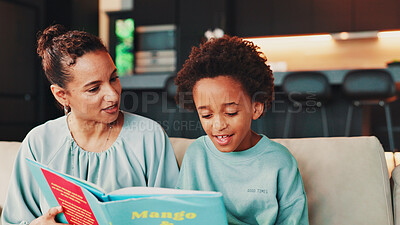 Buy stock photo Reading, mother and child with book on sofa for storytelling, literacy development or literature fairytale. African family, woman and boy in home with fantasy novel for knowledge and learning support