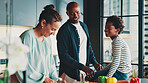 Parents, boy and happy with cooking in kitchen, home and learning for diet with vegetables, bonding and support. Mother, father and child with smile, food and nutrition in African family house