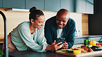Mature couple, phone and cooking in kitchen with vegetables, happy or search for recipe on web. People, man and woman with smartphone, mobile app or tutorial with video for food, diet or nutrition