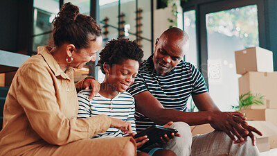 Buy stock photo Black family, child and tablet with boxes at new house for property, investment and apartment purchase. Parents, kid and real estate with digital for relocation, renovation plan and interior design