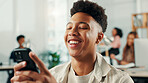 Smile, creative and man with phone in office for communication, reading email and website update. African person, mobile and laughing for research, schedule and funny report for development proposal
