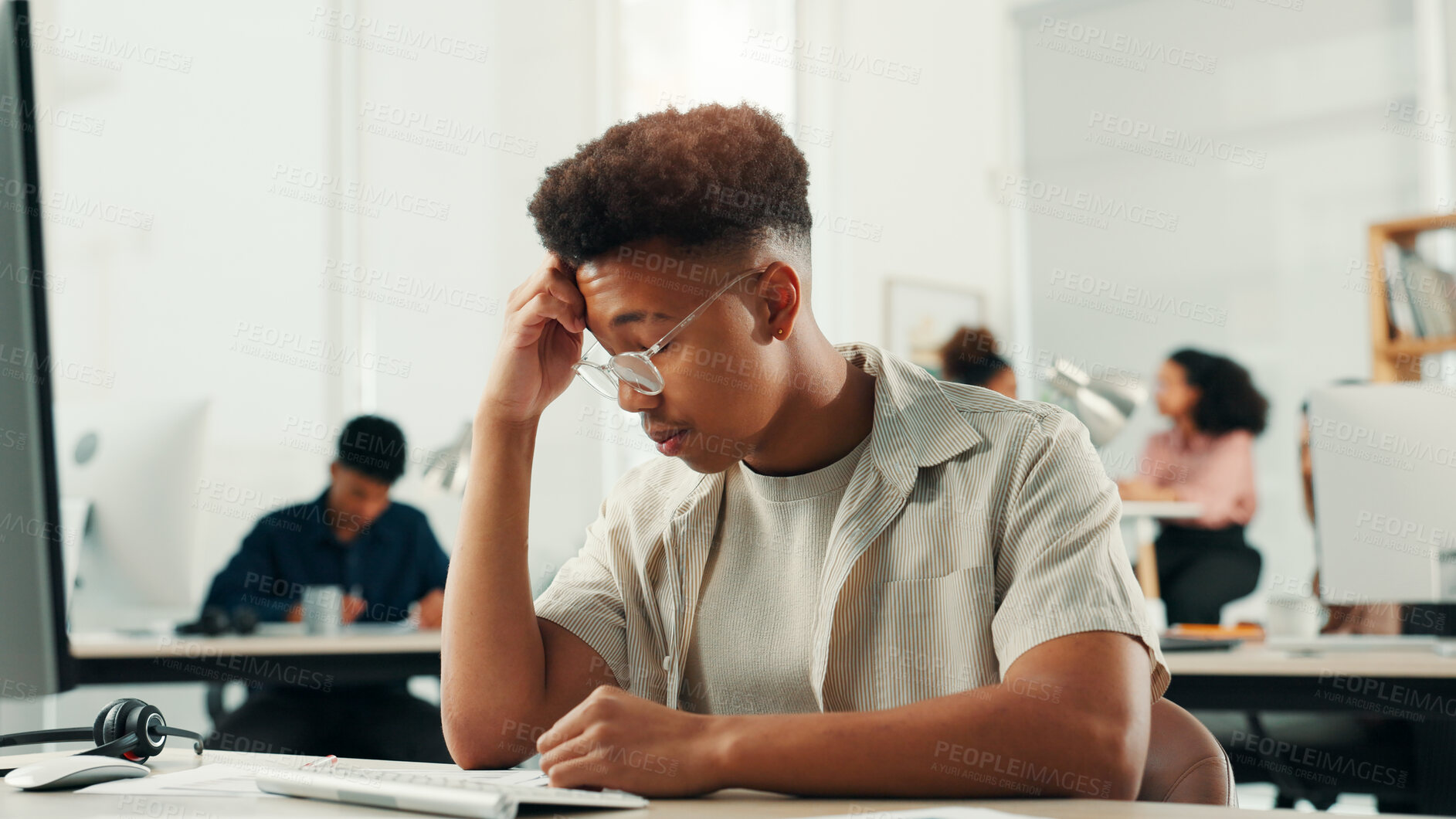 Buy stock photo Anxiety, computer and headache with designer man in office for project or reporting deadline. Frustration, stress and web development with small business employee in creative startup for solution