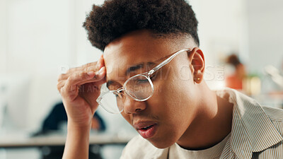 Buy stock photo Burnout, headache or stress with designer man in office for project or reporting deadline. Anxiety, frustration and glasses with small business employee in creative startup for problem solving