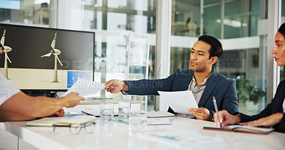 Buy stock photo Business people, meeting or documents with discussion for renewable energy or wind turbine development. Group, employee or paperwork with design, prototype or planning model for global sustainability