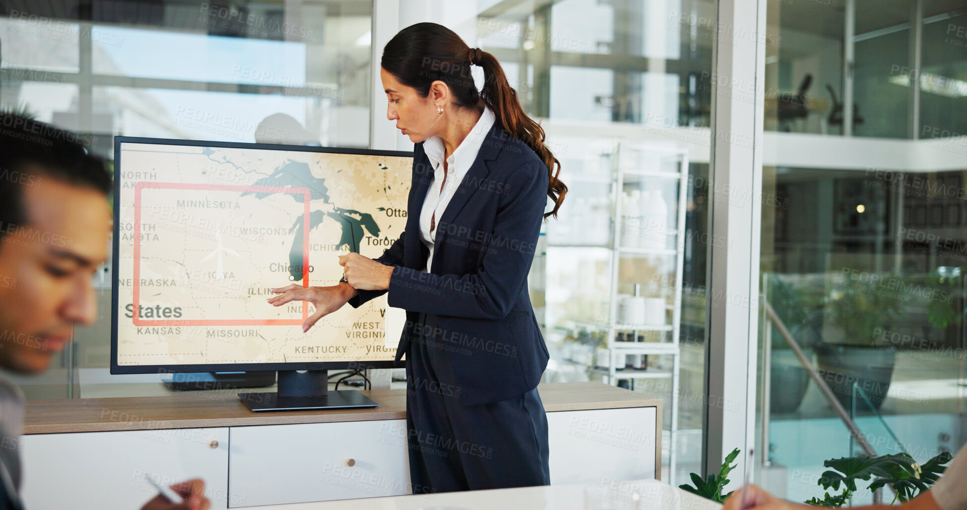 Buy stock photo Business woman, screen or presentation with map for renewable or clean energy at office. Female person, employee or speaker with technology display for wind turbine or global development at workplace