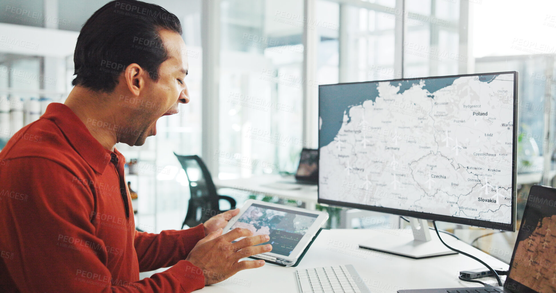 Buy stock photo Computer screen, tablet and wind turbine with man yawning in office for renewable energy or sustainability. Fatigue, tired and windmill with map on display for development, electricity or engineering