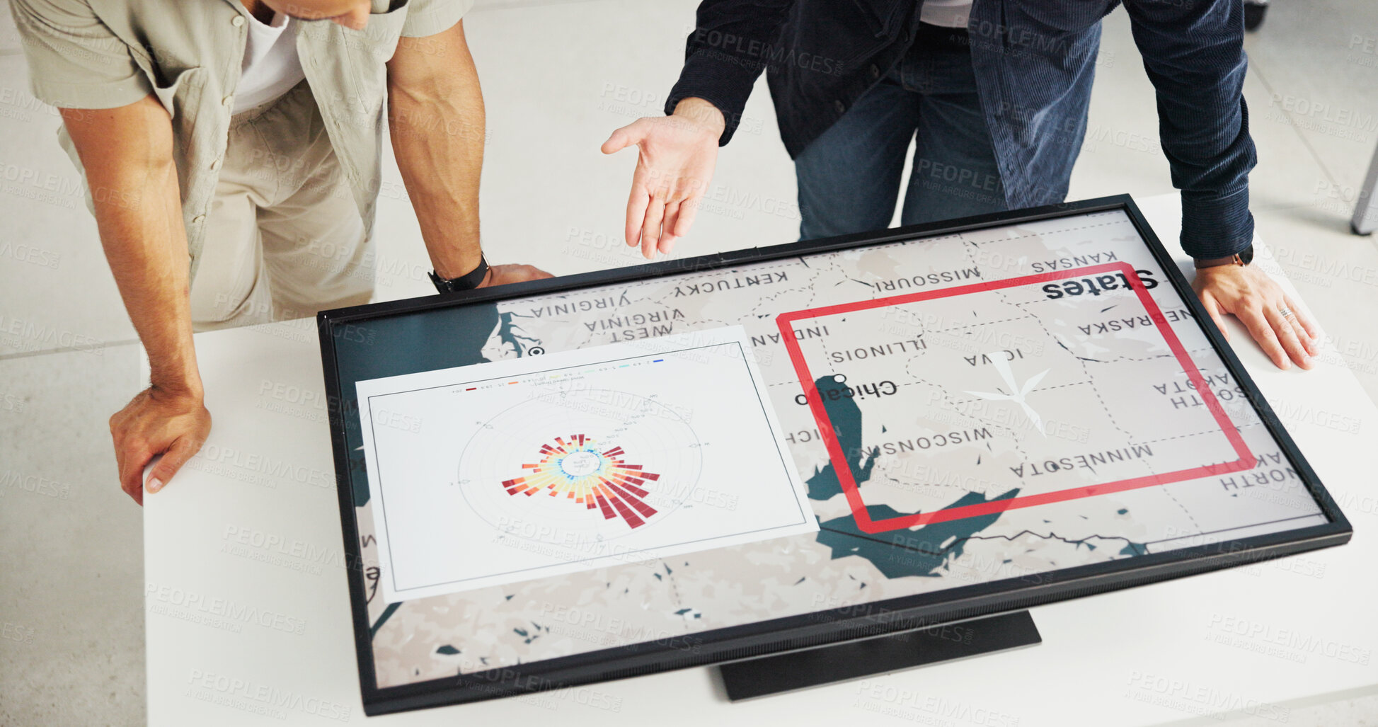 Buy stock photo Engineer, energy and hands with map on screen for turbine location, power development and renewable innovation. Interactive display, above and people pointing to wind rose diagram for speed direction