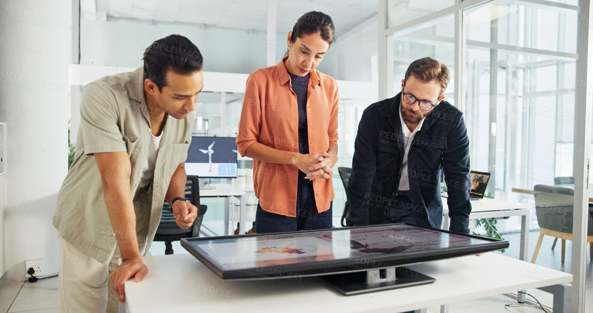 Buy stock photo Discussion, monitor and group with interactive display, collaboration and planning for windmill design. Teamwork, global and people with tech for map, wind turbine and renewable energy for world