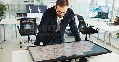Buy stock photo Business man, interactive display and map in office for sustainability, clean energy or wind turbine location. Global, world or worker with screen for planning project with renewable power specialist