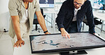 Engineer, people and hands with world map on screen for turbine location, power development and data analysis. Interactive display, teamwork and employee pointing to chart area for site selection