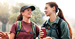 Women, hiking and talk with adventure, direction and tourism on holiday with fitness in nature. People, girl and friends with discussion, route and happy with drink, trekking and location in Italy
