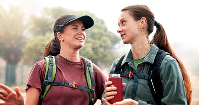 Buy stock photo Women, hiking and talk with adventure, direction and tourism on holiday with fitness in nature. People, girl and friends with discussion, route and happy with drink, trekking and location in Italy