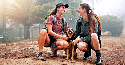 Buy stock photo Women, hiking and friends with dog in nature for memory, laugh and happy for tourism in countryside. People, girl and pet animal with love with bonding, stroke and outdoor on trail at park in England