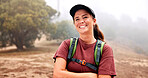 Happy, hiking and portrait of woman in nature for adventure, exploring or discovery on holiday. Excited, confident and female person from Australia on trekking and backpacking trip outdoor in forest.