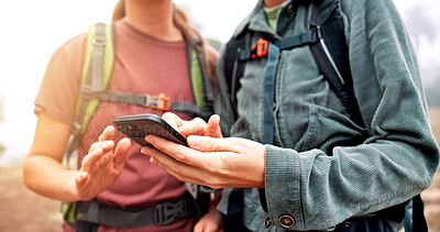 Buy stock photo Hands, hiking and people with cellphone, direction or lost with navigation, journey or hobby. Closeup, outdoor or friends with smartphone, internet or digital app for online guide, mountain or travel