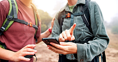 Buy stock photo Hands, hiking and people with smartphone, direction or lost with nature, journey or hobby. Closeup, outdoor or friends with cellphone, internet or digital app for online guide, mountain or navigation