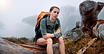 Woman, hiking and getting cold on mountain in winter, thinking and fatigue with weather change, fog and tourism. Person, girl and trekking with trunk, exhausted and tired on adventure in Argentina