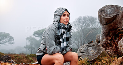 Buy stock photo Woman, hiking and getting cold on trail, tree trunk or confused for direction, thinking or stress in nature. Person, lost and rest in forest, tired or remember path to safety with winter in Argentina