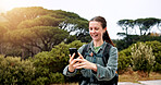 Hiking, video call and fitness with woman in nature for streaming, travel and adventure. Virtual chat, trekking and environment with person and mobile for eco tourism, backpacking and vacation