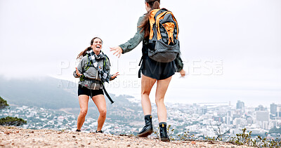 Buy stock photo Women, hiking and excited on mountain, celebration and achievement at summit with goals in nature. People, girl and friends with cheers, happy and trail with view, cityscape and adventure in Italy