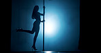Woman, light or club with pole for show, tease performance or sexy movement in silhouette. Night, exotic dancer and female person in practice routine for seduction, stripping or party entertainment