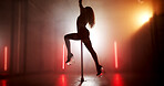 Stage artist or neon lights with pole for dancing, tease performance or sexy movement in routine. Show, silhouette or exotic female dancer in nightclub for seduction, stripping or party entertainment