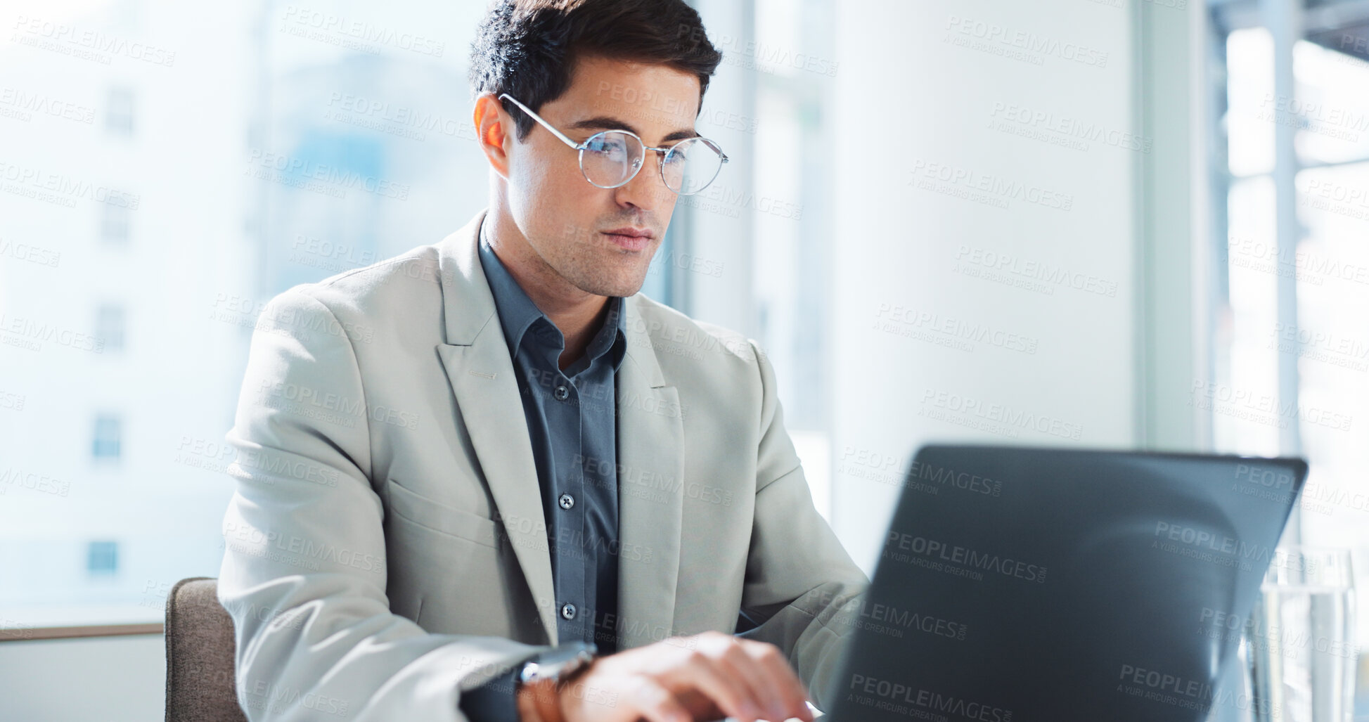 Buy stock photo Office, serious and business man on laptop for insurance, risk management or policy sales on internet. Technology, employee and reading email for financial coverage, review claims or research online