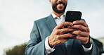 Businessman, hands or typing with phone in city for social media, career opportunity or chat. Closeup, happy man or employee with smile on mobile smartphone for network, connection or texting in town