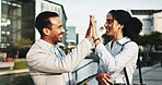 Business, celebration and people high five with tablet in city for investment success, b2b deal or partnership. Finance employees, teamwork or happy with support for digital contract or collaboration