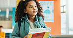 Student, child and walk with books, hallway and backpack for class, lesson or recess at campus or academy. Pupil, girl and growth for education, development and scholarship in learning or school