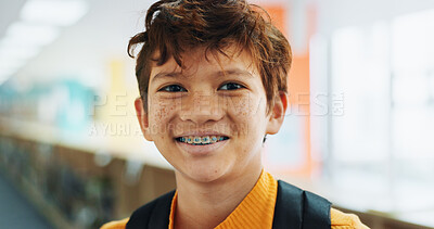 Buy stock photo Portrait, education and boy with braces, student and confidence with smile, knowledge and learning academy. Face, happy kid and childhood with backpack, studying opportunity and campus with pride